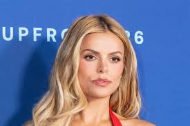 Baywatch beauty nearly spills out of tiny dress as she turns heads on red carpet