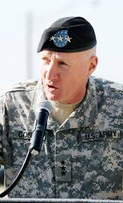 Bob Cone, III Corps and Fort Hood commanding general, shown here addressing a crowd gathered near the III Corps flagpole March 31, will relinquish command ... - size0-army.mil-106109-2011-04-21-190423