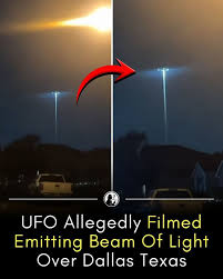 Huseyin - Video filmed in Dallas, Texas is circulating online after appearing to show a UFO sending a concentrated beam of light toward the ground. The footage was recorded by a local