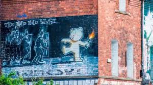 Who is Banksy? Unmasking the elusive street artist