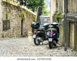 Immagine di Bergamo city with a motorcycle in the foreground