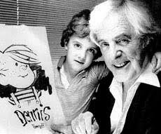 This March 14, 1983 photo captures Hank Ketcham with one of his sons, Scott, then 6, and his cartoon creation Dennis the Menace, who always turns 6 on March ... - 20010611life