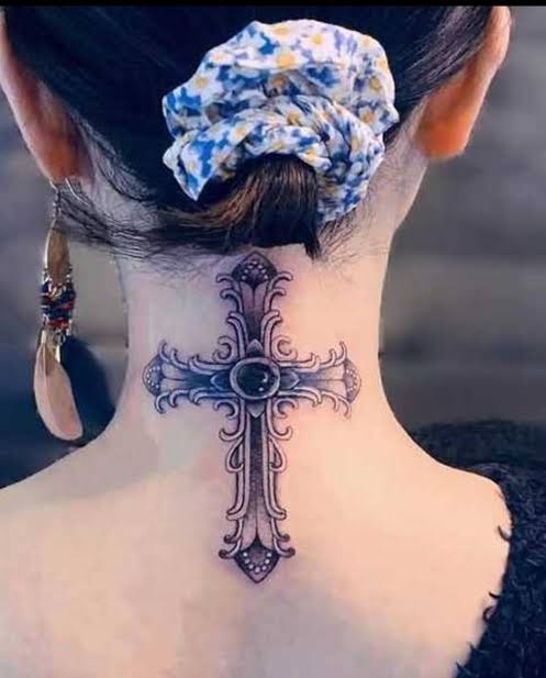 Three crosses on the back of my home girls neck… a strong symbol ...
