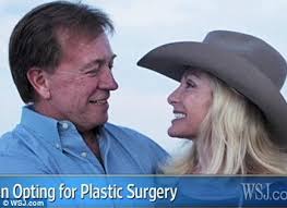 Proud of his new look: David Culpepper, pictured with his new wife Cindy, says he is considering having eyelid surgery too - article-0-0C3E63EB00000578-71_468x340