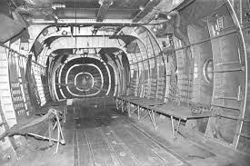 Αποτέλεσμα εικόνας για Μετά την επιστροφή απο την Κύπρο,ο κυβερνήτης του "Νίκη 8" Ν.Τζανάκος, δείχνει την διάτρητη απο σφαίρες δεξιά πτέρυγα του Noratlas 52-144.