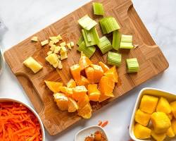 ingredients being prepped on a cutting boardの画像