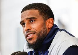 Bobby Wagner delivering a speech at Utah State University
