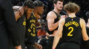 Warriors' Jimmy Butler helped off with knee injury vs. Heat