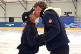 Evan Bates Shares Sweet Kiss with Wife Madison Chock After She Reveals He’s Been Chosen as Team USA Flag Bearer