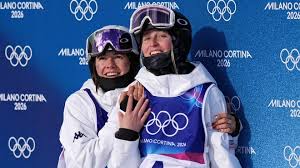 Elizabeth Lemley celebrates her gold medal victory at the Winter Olympics