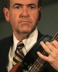 Mike Huckabee and his bass. (Thanks to Aaron Webb for the photo.) How do you know when the presidential campaign season has begun? - Mike-Huckabee-242x300