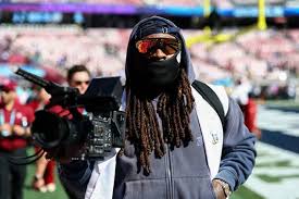 Former Seahawks Player Marshawn Lynch Is on the Sidelines for Super Bowl 2026— as a Cameraman