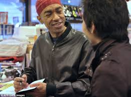 Image result for mark obama half brother