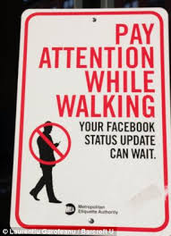 Image result for LOOKING AT CELLPHONE WHILE WALKING