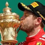 Vettel edges Hamilton take British