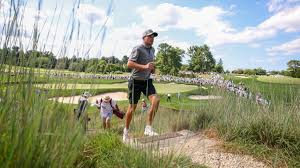 With dad on bag, England’s Jack Whaley plays on at Merion