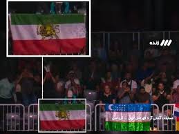 نمایش پرچم شیر و خورشید از صداوسیمای جمهوری اسلامی در پخش زنده مسابقات جهانی کشتی