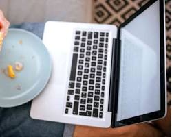 Image of person eating a simple meal at home