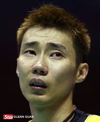 Teary outcome: Lee Chong Wei (left) in tears after injuring his ankle during the match against Denmark&#39;s Peter-Gade Christensen ... - chongwei2