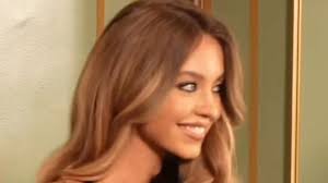 Sydney Sweeney’s steamiest Syrn photoshoots yet - from black lace bra and thong to plunging see-through teddy
