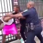 Baltimore cop on paid leave after viral video shows him beating a man