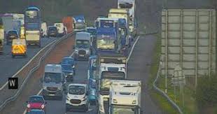 Major delays on M8 motorway after lorry sheds load