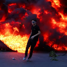 Banks, buildings burn as Albania's capital Tirana erupts into student violence