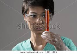 Doc Hand Holds Test Stock Photos, Illustrations, and Vector Art - stock-photo-female-chinese-healthcare-professional-or-scientific-researcher-holding-a-test-tube-139111799