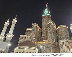 Makkah Royal Clock Tower and Grand Mosque night view high resolution official photo, AI generated