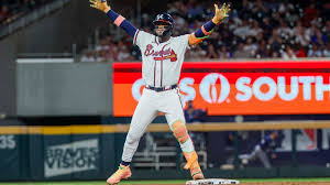 Atlanta Braves and Philadelphia Phillies players during a critical NL East matchup