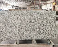 Image of Tiger Rust Granite Slab in a Kitchen Countertop Setting