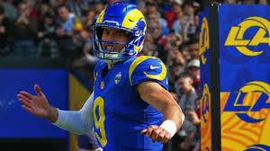 New York Giants and Los Angeles Rams players preparing for Monday Night Football
