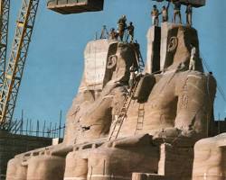 Image of Abu Simbel temples being relocated to higher ground, illustrating the international effort to save them from the rising waters of Lake Nasser.