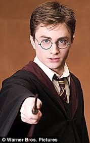 Magic: The wand created by Chris Barnardo, above right, resembles the one used by Daniel Radcliffe in the Harry Potter films - article-1305699-0AE625D2000005DC-785_224x356