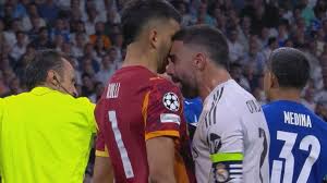 Real Madrid captain sent off for headbutting goalkeeper after police in riot gear clash with fans