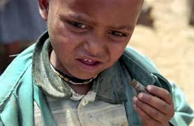 Boy with a bullet cartridge ©Sami Sallinen - Sallinen10-Boy%252520with%252520bullet%252520cartridge