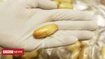 India police extract cocaine capsules
