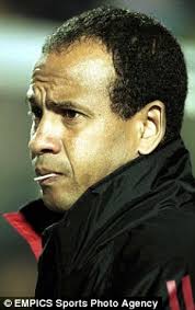 Jean Tigana. Former chain-smoker Tigana strikes a familiar lollipop-chewing pose on the touchline. Jean Tigana has ruled out the possibility of becoming the ... - article-0-004B389900000258-287_233x371