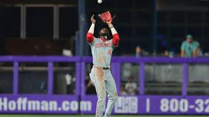 Cincinnati Reds in action, celebrating their fourth consecutive win