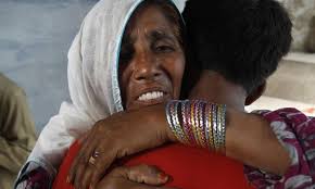 Taj bibi reunites with her grandchild, Zeeshan Ali, after six years. — AP - 51ee816384b04
