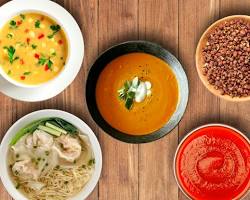 bowl of spicy soup with various ingredientsの画像