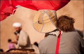 Photo:<b>Mohammad Javad Jahangir</b>. A man and his child listen to a priest tell <b>...</b> - _45604344_img_8436