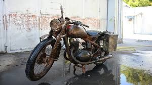Striking images: Wehrmacht motorcycle from Danube looks almost 'new'