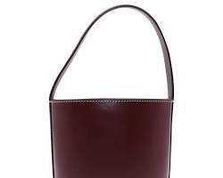 Image of supple leather bucket bag in a rich burgundy hue