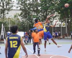 Image of Students playing basketball in an IIIT sports tournament