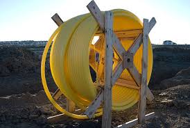 Yellow Construction Piping On A Large Spool Stock Photo ...