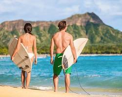 Image of someone relaxing on a beach with a surfboard and a healthcare brochure