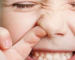 Image of Picking their nose