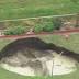 Sinkhole begins collapsing Brisbane backyard