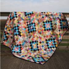 Résultat de recherche d'images pour "Scrappy 2 1/2 inch square quilt patterns"